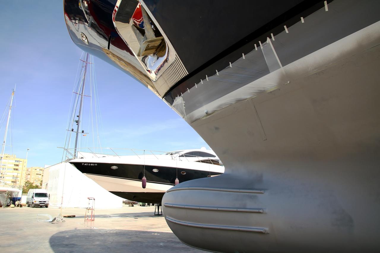 Yacht hull out of water at shipyard